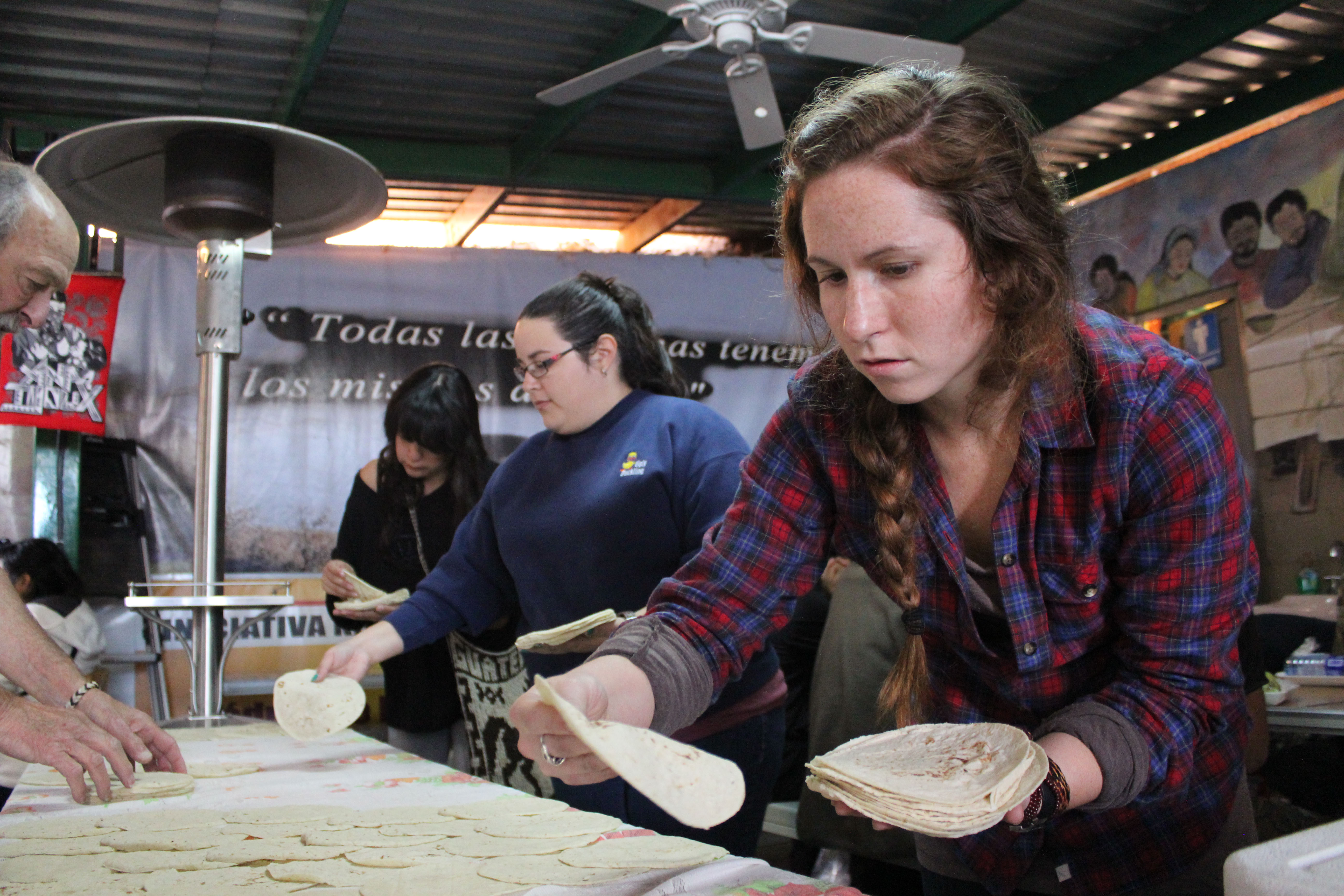Student making tortillas
