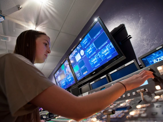 Journalist working in studio 